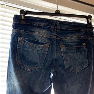 Semi-distressed jeans. Size 24.